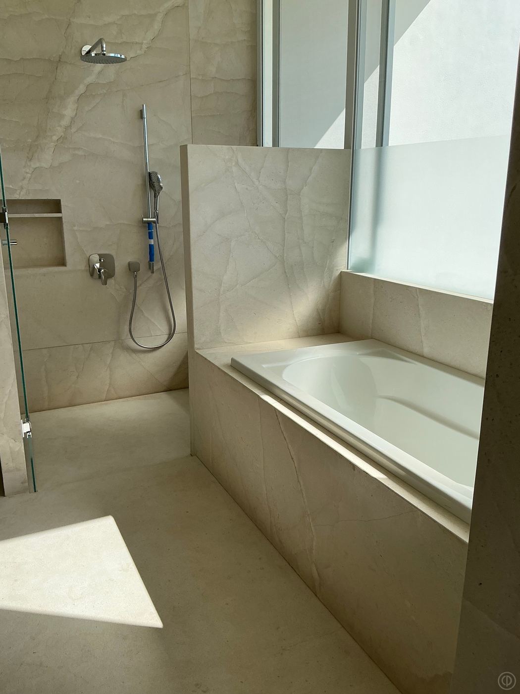 Bathroom · marble walls & tub surround — Private residence