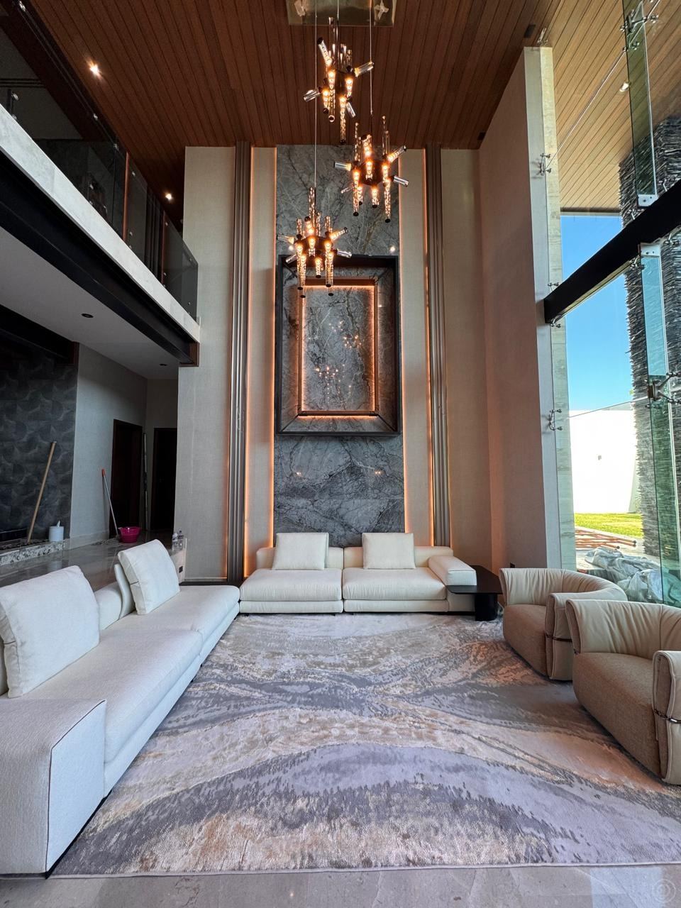 Living room · stone feature wall & marble floor — Private residence