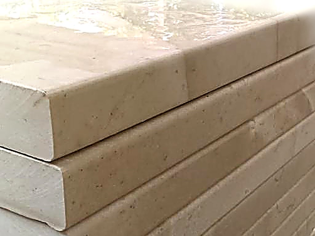 Bullnose pool coping, stacked at the factory