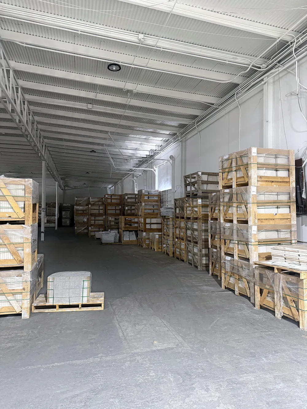 Pallets of pavers and coping in the Fort Worth warehouse